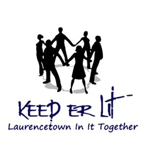 A circle of people holding hands and facing outwards with the text "Keep 'Er Lit Laurencetown In It Together"